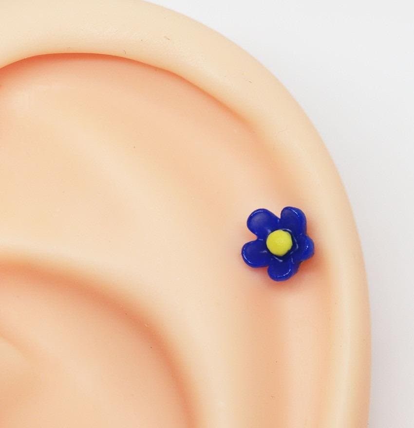 Piercing Flor Azul Royal