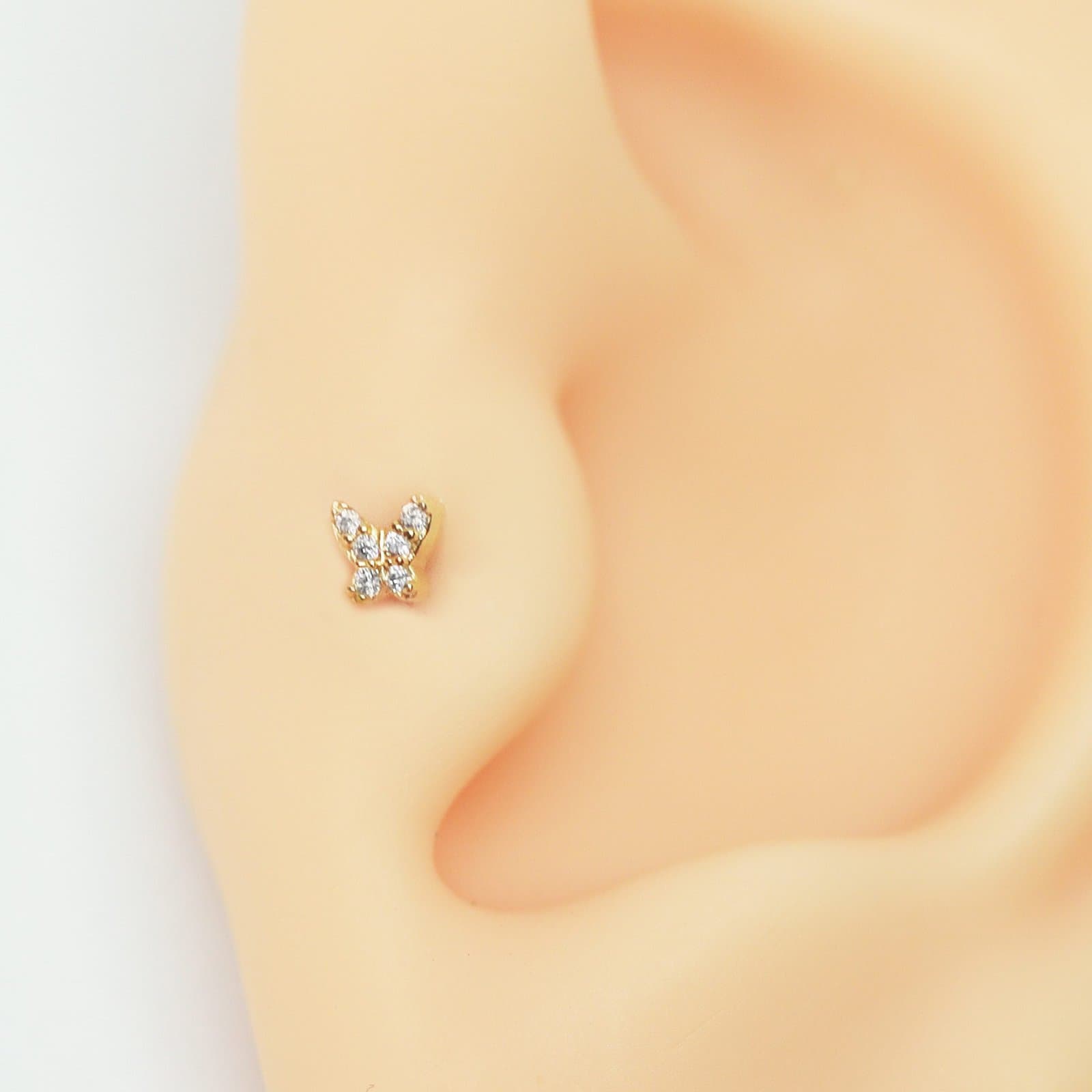 Piercing Trágus Mini Borboleta Cravejada Folheada